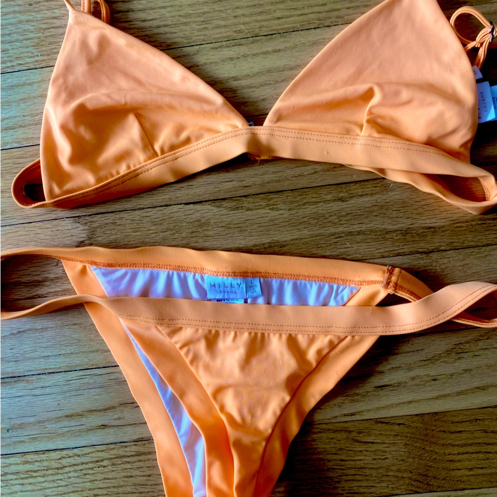 Milly bikini set. Size Large bottom and size Medium top.